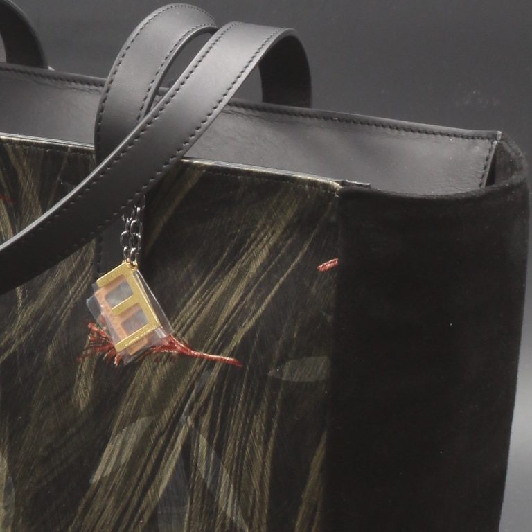 Bag in black suede and silk by day