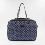 borsa a mano blu e nera in seta con stampa geometrica