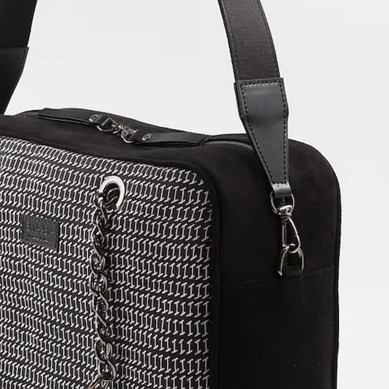 Schwarze und weiße Seidentasche mit Lederbesatz Details Schwarze und weiße Seidentasche mit Lederbesatz Details