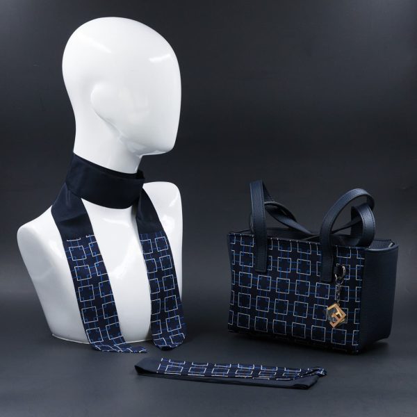 Borsa a spalla in vera pelle e seta geometrica