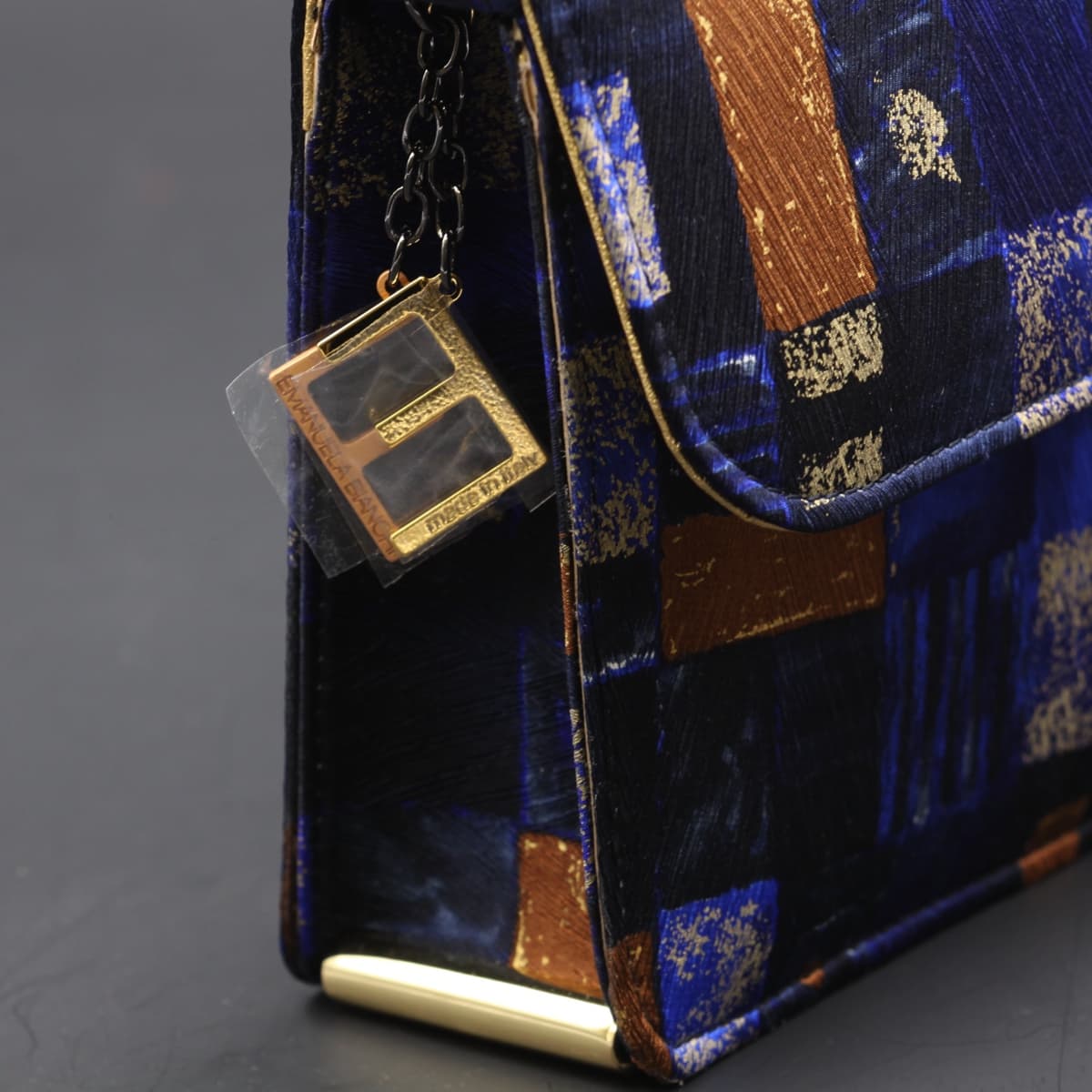 kit clutch leather geometric