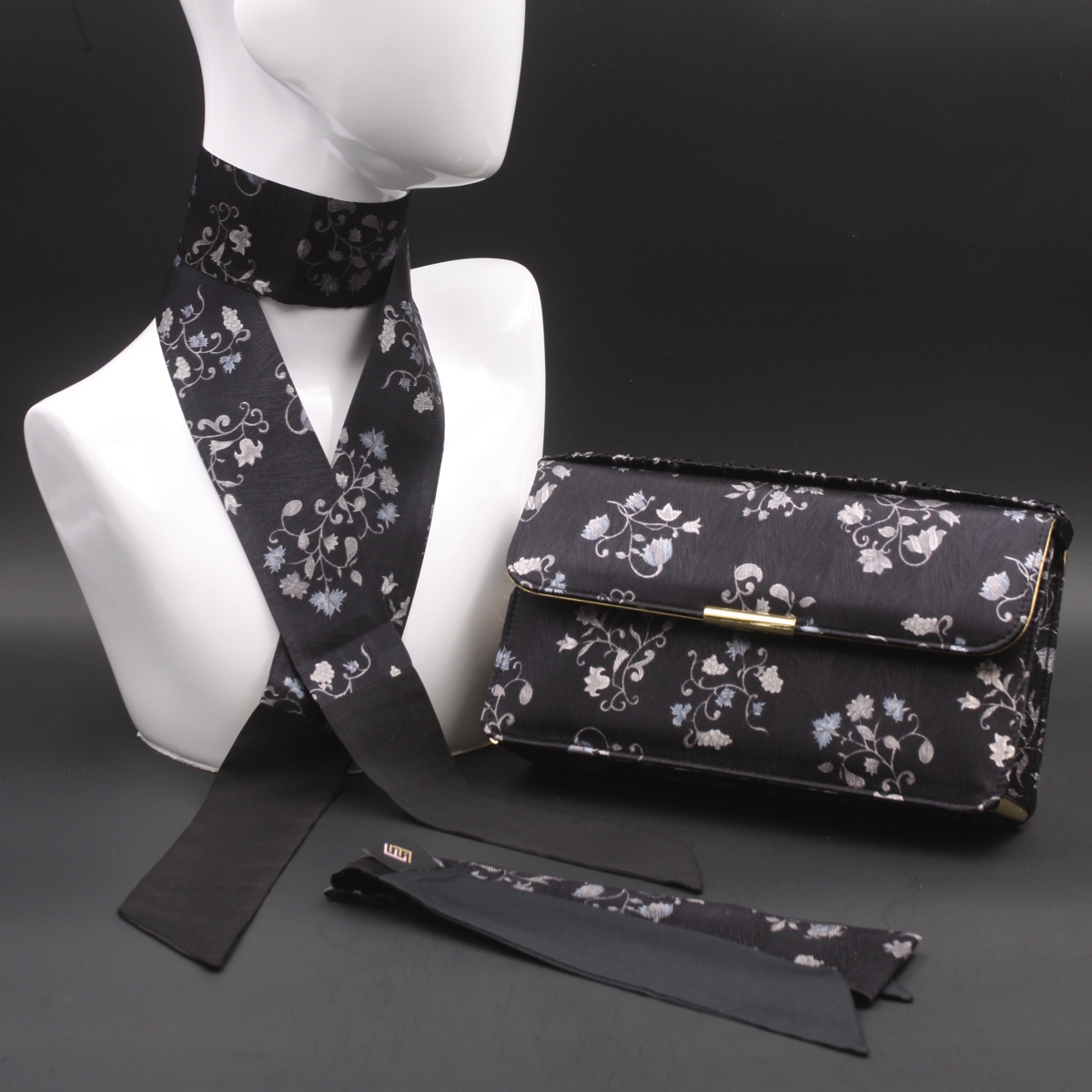 Kit Clutch in seta e pelle con fiori