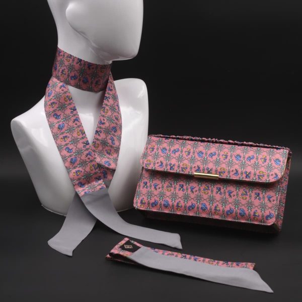 Kit Clutch in seta stampata rosa