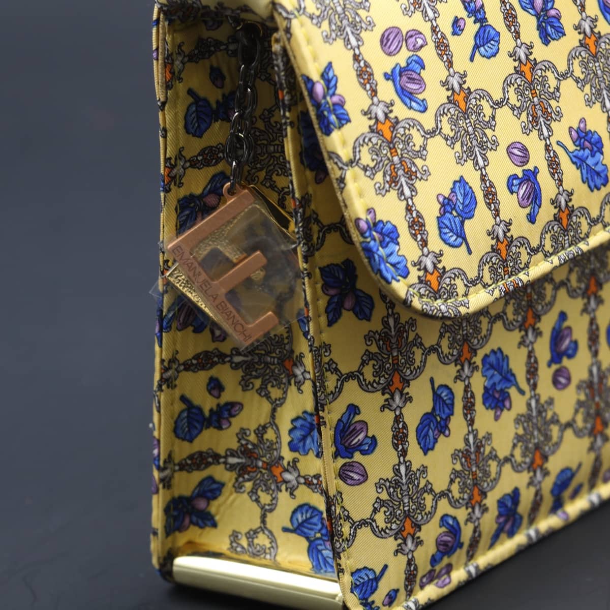 Kit clutch con disegno geometrico giallo