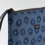 Clutch bag in denim blue silk with floral print