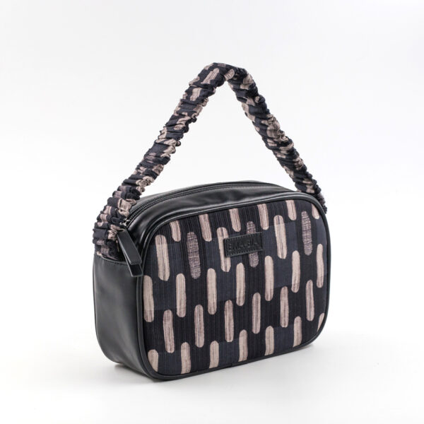 Borsa in seta e pelle con stampa geometrica